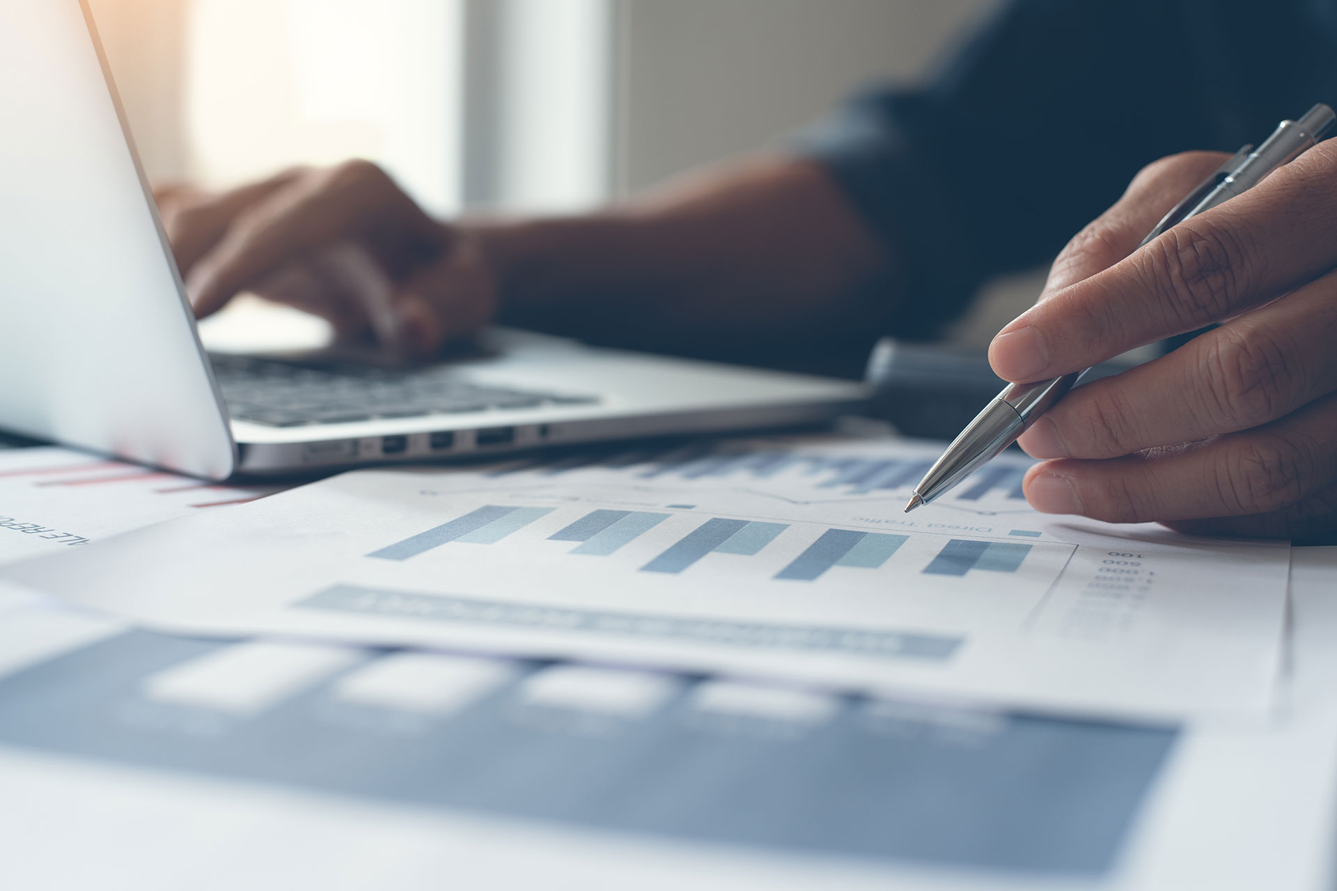 Supply chain management team reviewing profit and loss impacts beyond unit price decisions